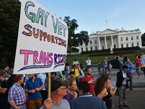 This file photo taken on July 26, 2017 shows protesters gathering in front of the White House in Washington, DC.