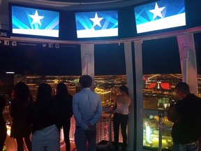 A group of people look out on the Las Vegas Strip during a ride on The High Roller, the world’s tallest observation wheel at 156.5-metres high. SARAH DOKTOR/POSTMEDIA NETWORK