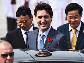 Canada's Prime Minister Justin Trudeau (C) arrives at the international airport ahead of the Asia-Pacific Economic Cooperation (APEC) Summit in the central Vietnamese city of Danang on November 10, 2017.   AFP PHOTO / Ye Aung ThuYE AUNG THU/AFP/Getty Images