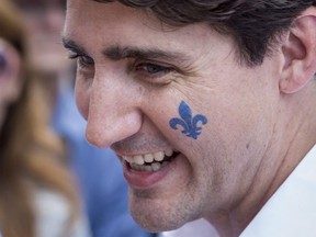 Justin Trudeau Prime Minister Justin Trudeau sports a Fleur de Lis on his cheek at a street party for the Fete National du Quebec on June 24, 2017 in Montreal.