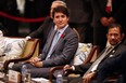 Prime Minister Justin Trudeau (C) and Brunei's Sultan Hassanal Bolkiah (R) attend the APEC-ASEAN dialogue on the sidelines of the Asia-Pacific Economic Cooperation (APEC) leaders' summit in the central Vietnamese city of Danang on November 10, 2017. (JORGE SILVA/AFP/Getty Images)