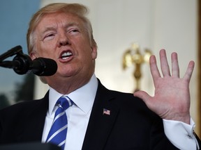 President Donald Trump speaks about his trip to Asia in the Diplomatic Reception Room of the White House, Wednesday, Nov. 15, 2017, in Washington.