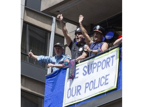 Showing support for Toronto Police 2017 Pride Parade in Toronto on Sunday June 25, 2017. (Craig Robertson/Toronto Sun/Postmedia Network)