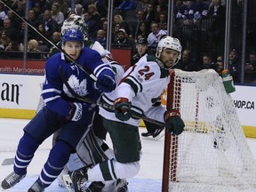 Toronto Maple Leafs centre Zach Hyman (11) and Minnesota Wild defenceman Matt Dumba (24) on Wednesday, November 8, 2017 at the ACC.