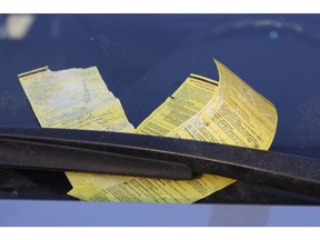 A bunch of parking tickets on a car windshield in Toronto. Stan Behal/Toronto Sun