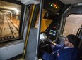 TTC subway operator Gus Tzirivilas sits at the controls of subway train on auto-pilot heading southbound between Yorkdale and Dupont Stations in Toronto, Ont., on Friday, Nov. 3, 2017. Even though the train is controlled by a computer, the operator has to keep him hands on the controller at all times.