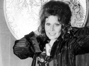 In this June 4, 1978 file photo, actress Ann Wedgeworth poses at Sardi's restaurant following the 32nd Annual Tony Awards in New York City where she won best actress in a featured role for her performance in "Chapter Two." (AP Photo/File)