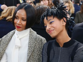 Willow Smith (R) the daughter of US actor Will Smith and her mother Jada Pinkett Smith attend the Chanel 2016-2017 fall/winter ready-to-wear collection on March 8, 2016 in Paris. (FRANCOIS GUILLOT/AFP/Getty Images)