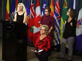 Members of the Thalidomide Survivors Task Group hold a news conference on Parliament Hill, in Ottawa, Tuesday, December 5, 2017.