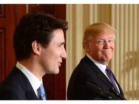 Prime Minister Justin Trudeau and U.S. President Donald Trump take part in a joint press conference at the White House in Washington, D.C. on Feb. 13, 2017.  THE CANADIAN PRESS/Sean Kilpatrick