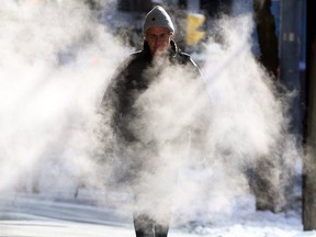 A pedestrian in Toronto endures Thursday's frigid winter weather.
