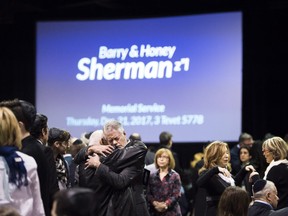 Mourners at the memorial service for Barry and Honey Sherman.