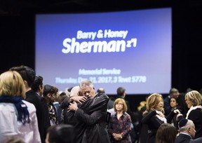 Mourners at the memorial service for Barry and Honey Sherman.