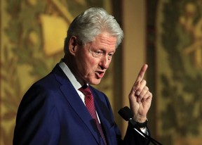 Oddly, Bill Clinton was the one who walked away from the scandal largely intact. THE ASSOCIATED PRESS
