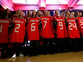 Members of the Canadian women's Olympic hockey team pose for a team photo on Dec. 22, 2017