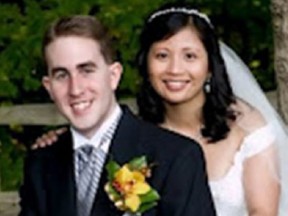 Philip Grandine poses with Anna Grandine on their wedding day in 2008.
