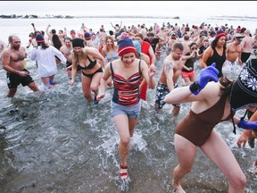 Not this year! The annual Toronto Polar Bear Dip has been cancelled due to the frigid temperatures. In 2014, it was a different matter. POSTMEDIA
