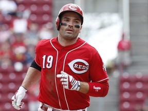 Joey Votto #19 of the Cincinnati Reds rounds the bases after a solo home run in the seventh inning against the New York Mets at Great American Ball Park on August 31, 2017 in Cincinnati, Ohio. (Joe Robbins/Getty Images)