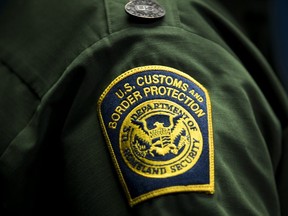 A  U.S. Customs and Border Protection patch is displayed on the sleeve of Ronald D. Vitiello, Acting Deputy Commissioner of U.S. Customs and Border Protection (CBP), as he speaks during a Department of Homeland Security press conference to announce end-of-year numbers regarding immigration enforcement, border security and national security, December 5, 2017 in Washington, DC. (Photo by Drew Angerer/Getty Images)