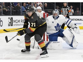 LAS VEGAS, NV - DECEMBER 31:  William Karlsson #71 of the Vegas Golden Knights tries to control the puck as Frederik Andersen #31 of the Toronto Maple Leafs tends net during the second period of their game at T-Mobile Arena on December 31, 2017 in Las Vegas, Nevada. The Golden Knights won 6-3.