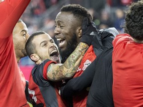 Toronto FC forward Sebastian Giovinco (10) and Toronto FC forward Jozy Altidore (17) celebrates Toronto FC winning MLS Cup in Toronto on Saturday December 9, 2017. (Craig Robertson/Toronto Sun/Postmedia Network)