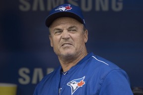 Toronto Blue Jays Manager John Gibbons stands in the dugout before Major League baseball action against the Boston Red Sox, in Toronto on Monday, August 28, 2017. THE CANADIAN PRESS/Chris Young