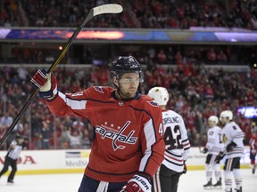 Washington Capitals right wing Tom Wilson (43) celebrates his goal during the first period of an NHL hockey game against the Chicago Blackhawks, Wednesday, Dec. 6, 2017, in Washington. (AP Photo/Nick Wass)
