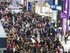 As seen in this file photo from the Eaton Centre, malls will be packed with shoppers hunting for Boxing Day bargains on Tuesday.