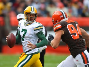 Brett Hundley #7 of the Green Bay Packers scrambles out of the pocket pursued by Carl Nassib #94 of the Cleveland Browns in the first quarter at FirstEnergy Stadium on December 10, 2017 in Cleveland, Ohio. (Photo by Gregory Shamus/Getty Images)