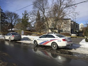 Police cars parked outside the home of billionaire Barry Sherman on Saturday, Dec. 17, 2017 in Toronto. Sherman and his wife were found dead in the north Toronto mansion on Friday, Dec. 16.