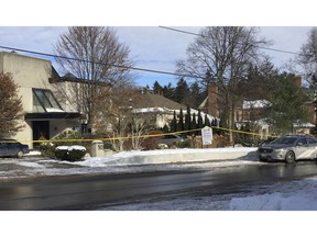 Police tape surrounds the home of billionaire Barry Sherman on Saturday, Dec. 17 2017, in Toronto. Sherman and his wife were found dead in the north Toronto mansion on Friday, Dec. 16.