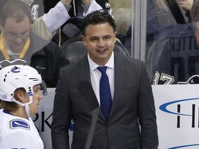 Ex-Leaf Travis Green is now a coach with the Canucks. (AP)