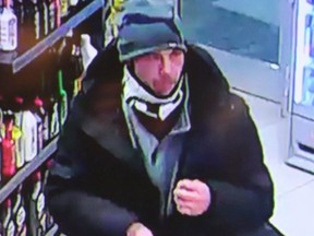 Police in southwestern Ontario say a toddler has been found safe after a car was stolen with the child still in it on Christmas Day. Ontario Provincial Police are asking the public to send any information about the suspect, seen here in a recent handout image from a surveillance camera. THE CANADIAN PRESS/HO-Ontario Provincial Police