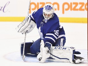 Toronto Maple Leafs goalie Curtis McElhinney (35) makes a save against the Edmonton Oilers during third period NHL hockey action in Toronto on Sunday, December 10, 2017. THE CANADIAN PRESS/Frank Gunn