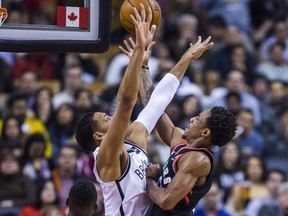 Toronto Raptors' DeMar DeRozan during against the Brooklyn Nets' Jahlil Okafor at the Air Canada Centre on Dec. 15, 2017