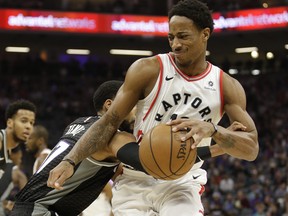 Toronto Raptors guard DeMar DeRozan, right, is fouled by Sacramento Kings guard Garrett Temple during the first half of an NBA basketball game Sunday, Dec. 10, 2017, in Sacramento, Calif. (AP Photo/Rich Pedroncelli)