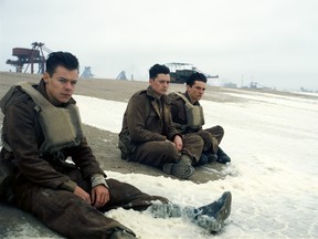 This image released by Warner Bros. Pictures shows Harry Styles, from left, Aneurin Barnard and Fionn Whitehead in a scene from "Dunkirk." (Warner Bros Pictures via AP)