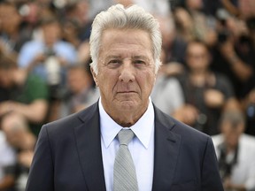 In this May 21, 2017 photo, actor Dustin Hoffman poses for photographers during the photo call for the film "The Meyerowitz Stories" at the 70th Cannes international film festival.