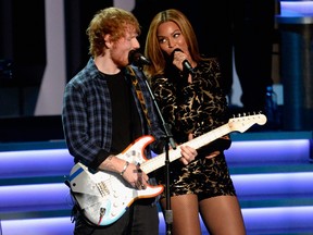 Ed Sheeran (L) and Beyonce perform onstage during Stevie Wonder: Songs In The Key Of Life - An All-Star GRAMMY Salute at Nokia Theatre L.A. Live on February 10, 2015 in Los Angeles, California. (Photo by Kevork Djansezian/Getty Images)