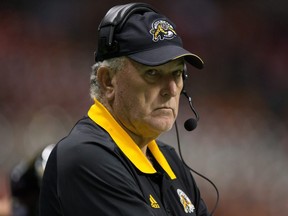 Hamilton Tiger-Cats' head coach June Jones stands on the sideline before a CFL football game against the B.C. Lions in Vancouver, B.C., on September 22, 2017. THE CANADIAN PRESS/Darryl Dyck