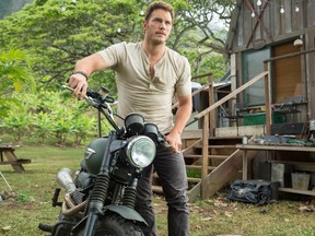 This photo provided by Universal Pictures shows, Chris Pratt, in a scene from the film, "Jurassic World." The sequel - "Fallen Kingdom" - will be released June 22, 2018.