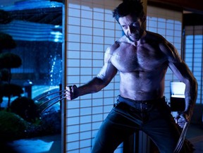 This publicity photo released by Twentieth Century Fox shows Hugh Jackman as Logan/Wolverine in a scene from the film, "The Wolverine."