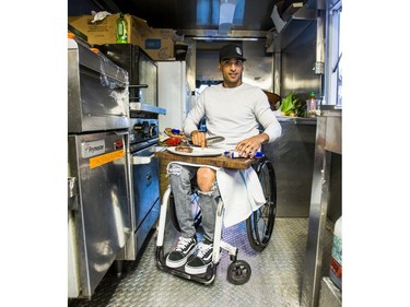 Aleem Syed, owner of Toronto food truck called - The Holy Grill - demonstrates food preparation in Toronto, Ont. on Friday December 1, 2017. Syed was paralyzed from waist down after being shot in a 2008 random shooting and has the first wheelchair accessible food truck.