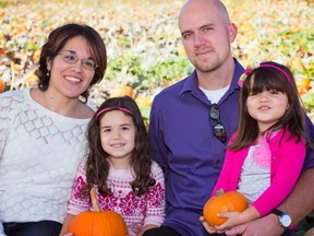 Jacob Forman with wife Clara Soledad Forman and daughters Karina Ann and Yesenia Kate. Jacob Forman is facing three counts of murder.