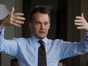 Veteran Affairs Minister Seamus O'Regan gestures during an interview in his office on Parliament Hill in Ottawa on Wednesday, December 6, 2017. New figures show the number of veterans waiting to find out whether they qualify for disability benefits has skyrocketed over the past eight months, leaving thousands of former military members in limbo.