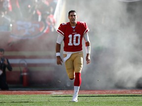San Francisco 49ers quarterback Jimmy Garoppolo is introduced before an NFL football game against the Tennessee Titans on Dec. 17, 2017