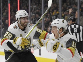 Vegas Golden Knights left wing Brendan Leipsic, right, celebrates his goal with right wing Alex Tuch during the third period of an NHL hockey game against the Los Angeles Kings, Thursday, Dec. 28, 2017, in Los Angeles.