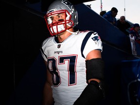 Rob Gronkowski of the New England Patriots walks to the locker room after warming up for a game against the Buffalo Bills on Dec. 3, 2017