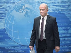 Nova Scotia Justice Minister Mark Furey arrives at a news conference to provide details about cannabis legalization in Halifax on Thursday, Dec. 7, 2017. (Andrew Vaughan/The Canadian Press)