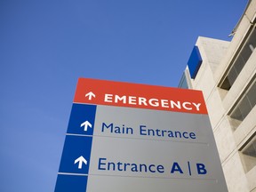 Emergency sign outside modern hospital